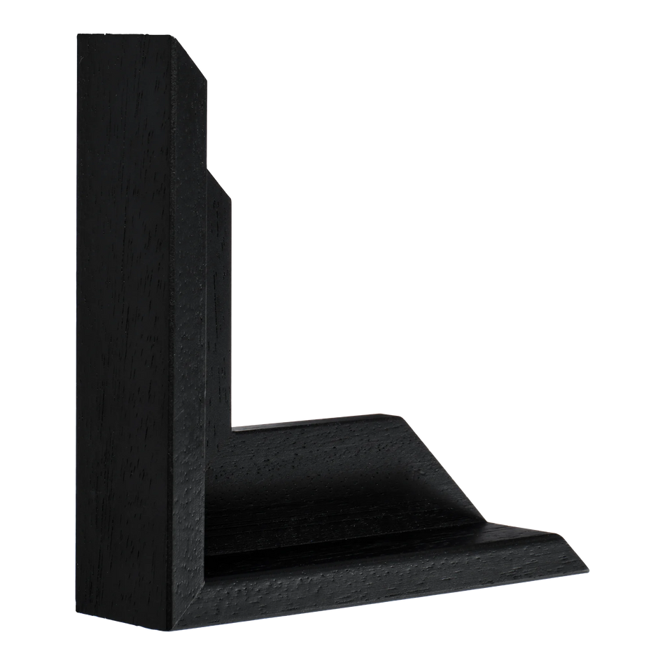 Vertical view of canvas float i black picture frame sample
